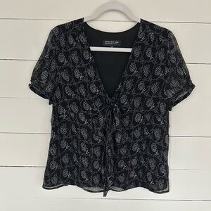 Jones New York Short Sleeve Black Blouse With White Flowers Printed all Over.